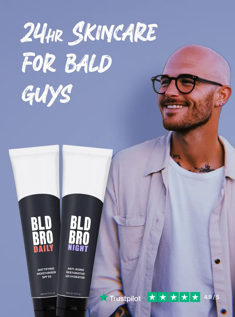 Man with glasses and a bald head next to 'Bld Bro' skincare products on a blue background