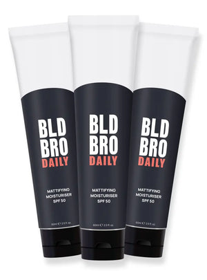 Three tubes of BLD BRO DAILY mattifying moisturizer on a white background