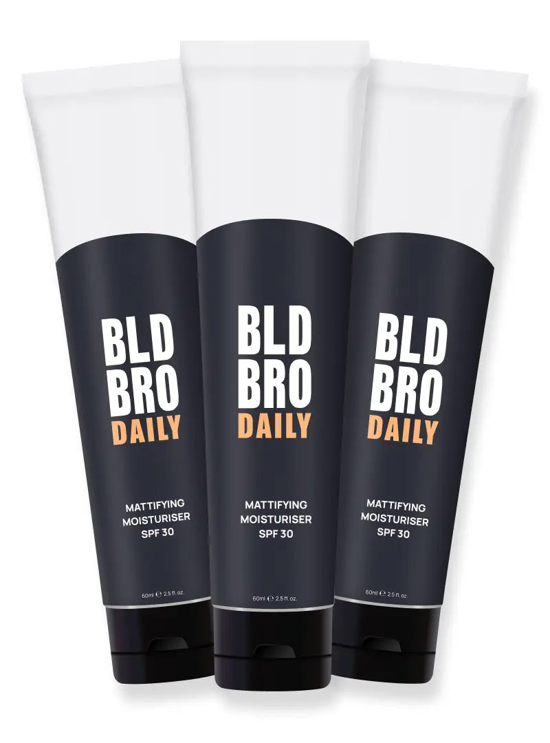 Three tubes of BLD BRO DAILY mattifying moisturizer on a white background