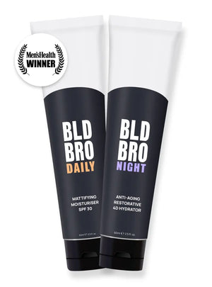 Two skincare tubes labeled 'BLD BRO Daily' and 'BLD BRO Night' with a Men's Health Winner badge on a white background.
